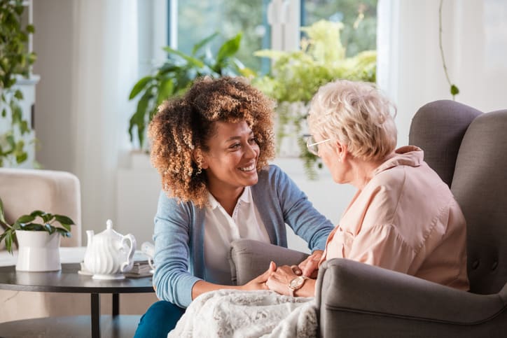 senior care provider with elderly senior woman
